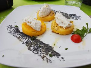 Venetian baccalà mantecato served with grilled polenta, a traditional Christmas Eve dish